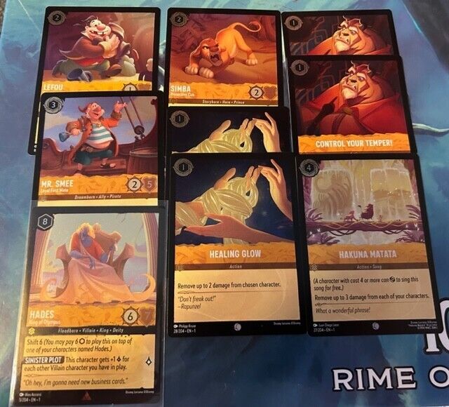 Lot of 9 Amber FOIL cards Disney Lorcana The First Chapter Hades Simba
